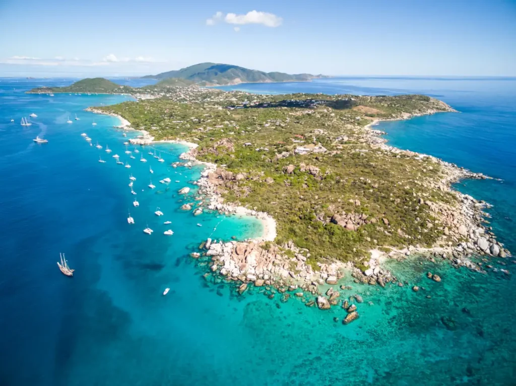 Aerial view of The Baths on Virgin Gorda, featuring dramatic granite boulders, turquoise waters, and sheltered coves, is one of the top Virgin Gorda things to know when visiting the British Virgin Islands.