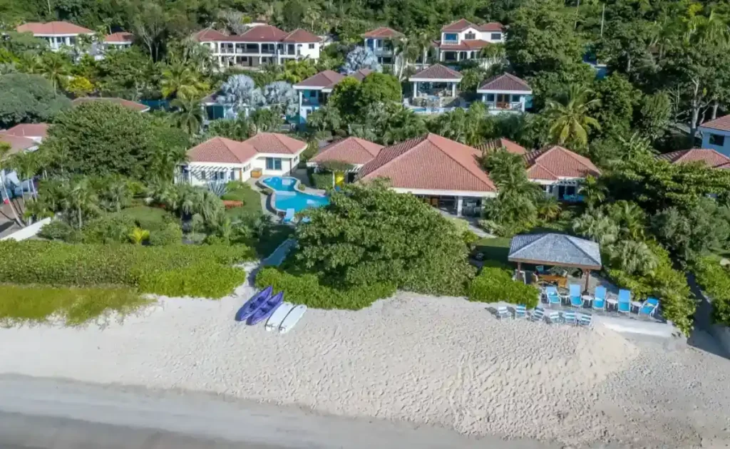 Aerial view of Beachcomber Villa set along the shoreline, highlighting the best BVI family villas.