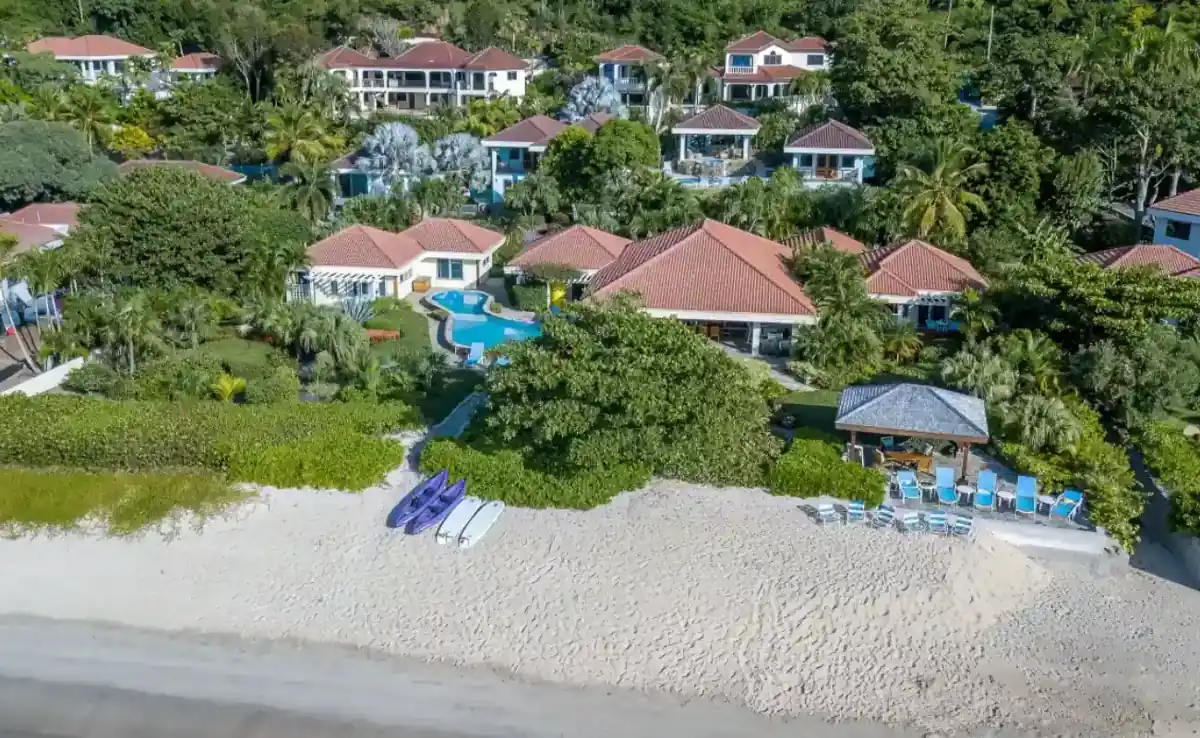 Aerial view of Beachcomber Villa set along the shoreline, highlighting the best BVI family villas.