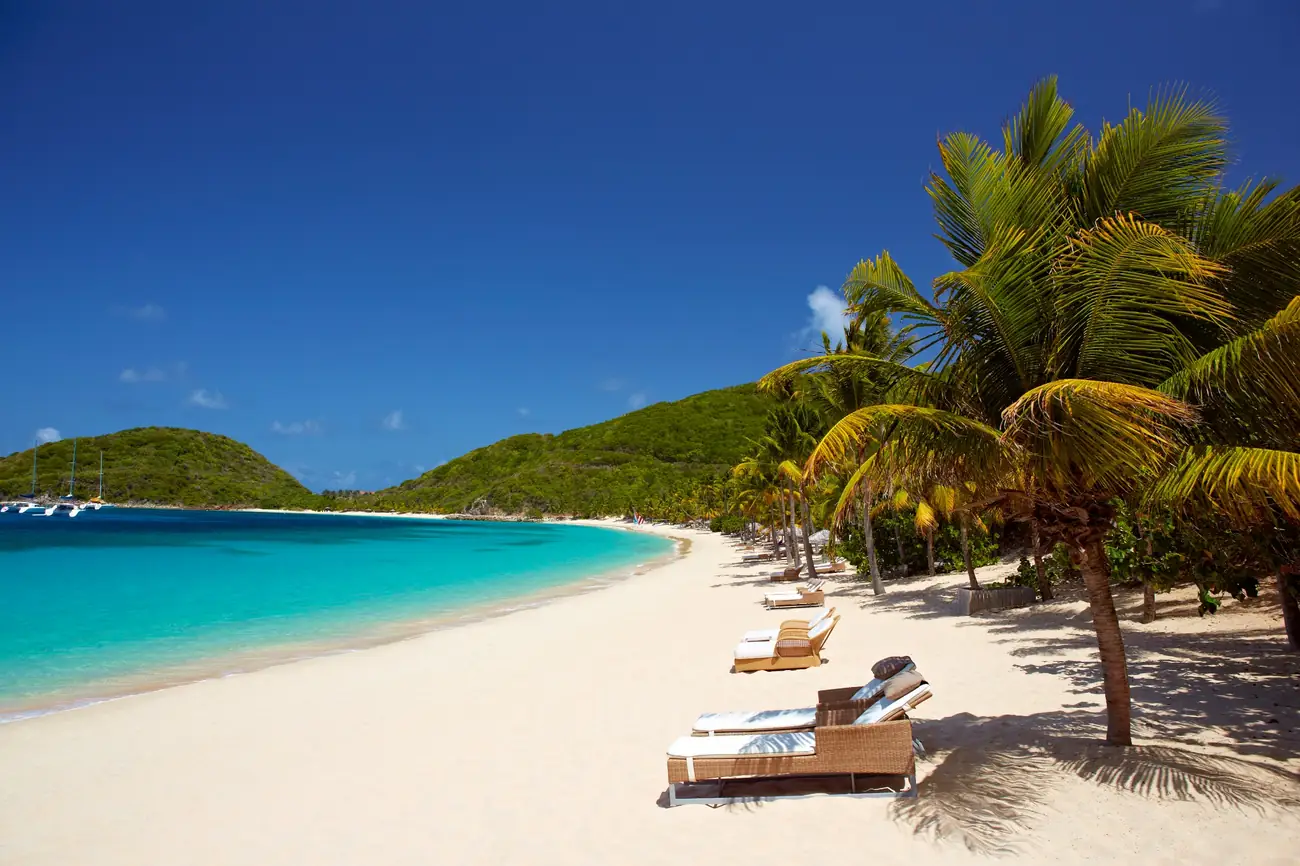 Beachfront loungers overlooking Deadman's Beach at Peter Island